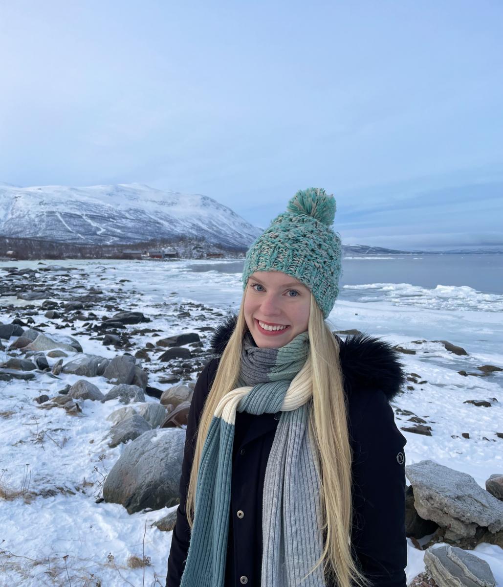 Jane in Sweden with snow behind her