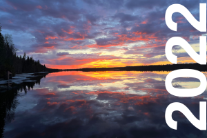 Midnight sun in Sweden over a lake