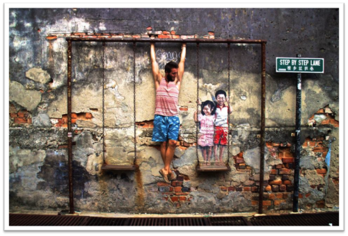 Picture of a student with local graffiti 